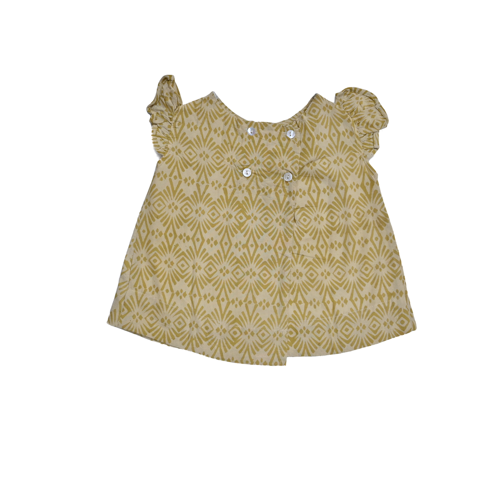 ethnic dress is perfect for your baby girl. Crafted with 100% cotton, the fabric is ultra-soft and ensures your little one is comfortable all day. Boasting a timeless design, this dress is handmade with care by our artisans. It comes with matching bloomers to make sure your baby's nappy won't peek out. Comfort is a priority with this dress, featuring buttons in the back for easy on-and-off. Baby clothes boutique. Baby clothing. Baby shower dresses.