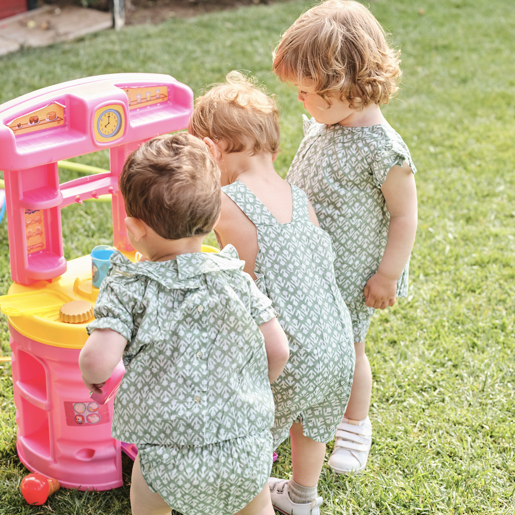 This stylish and practical green and white romper combines European style with an all-in-one fit for your little one. It features quality craftsmanship with buttons on the back and inner leg as well as being handmade with care by our artisans. An ideal choice for any fashion-conscious family. Baby clothes boutique. Baby clothes. Summer outfits for babies. 
